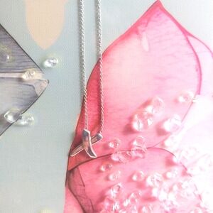 Authentic TIffany & Co. Paloma Picasso Graffiti “X” Kiss Necklace